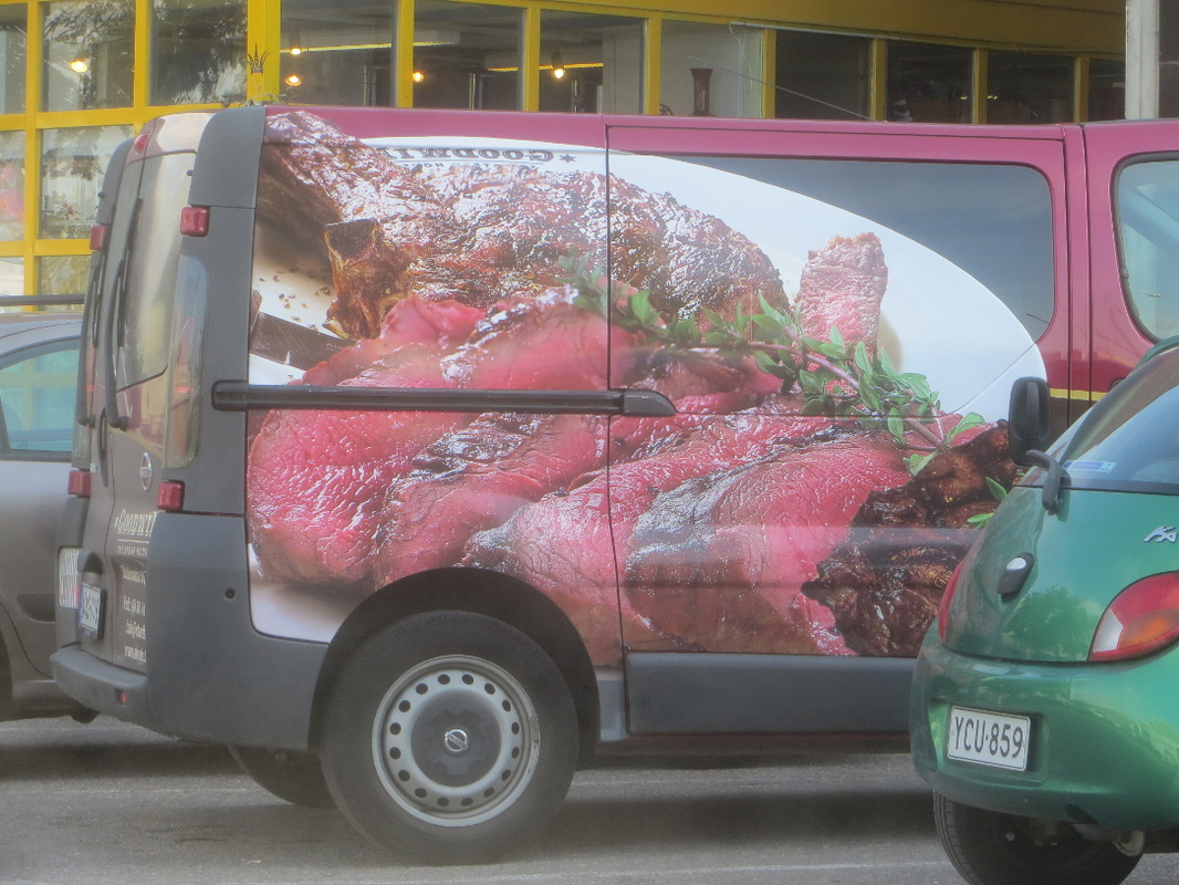 meat car advertisement city street photography